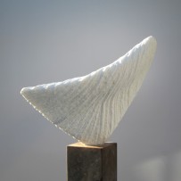 FENIX in Statuario marble
